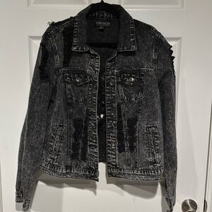 Distressed denim jacket